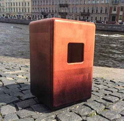 The Saint Petersburg Cajon Club's square sound hole is unique. Here the cajon sits along a river walkway.